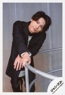 SixTONES / Hokuto Matsumura / Above Knee / Costume White / Black / Hand-Hand Handrail / Neck Tilt / Mouth Closed / "Artist Photography" Off Shot / Official Official photo